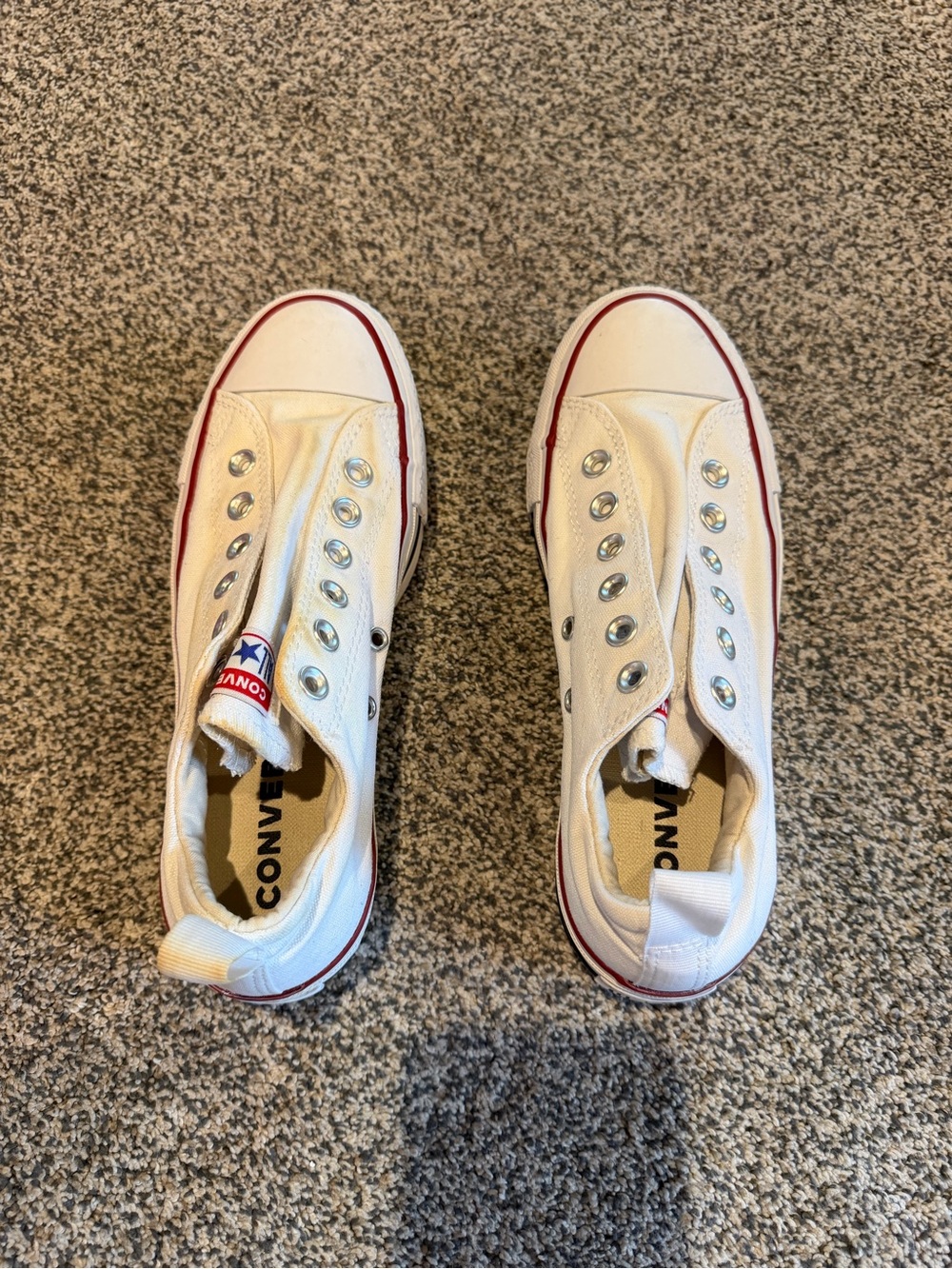 Converse Slip-On Canvas Sneakers in White with Red Trim